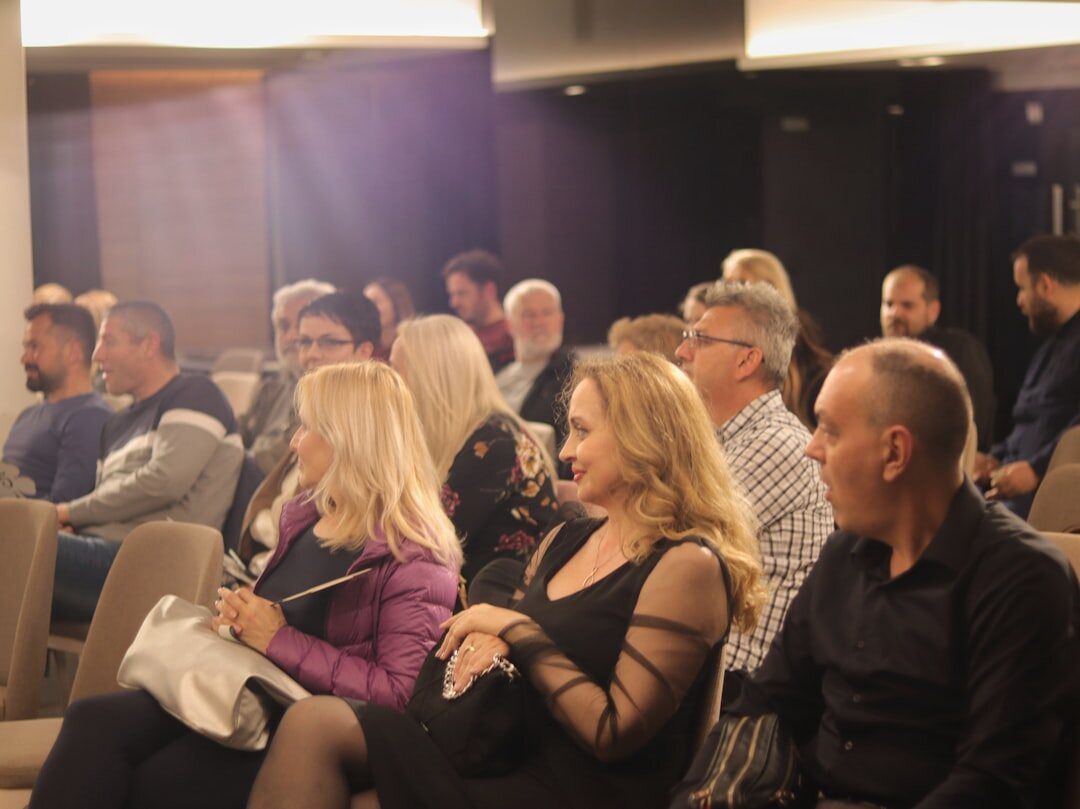 Participants in a public speaking and body language training workshop