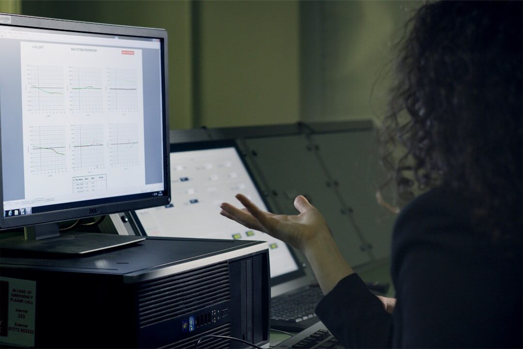 Journalist analyzing interview footage on a computer for analysis course